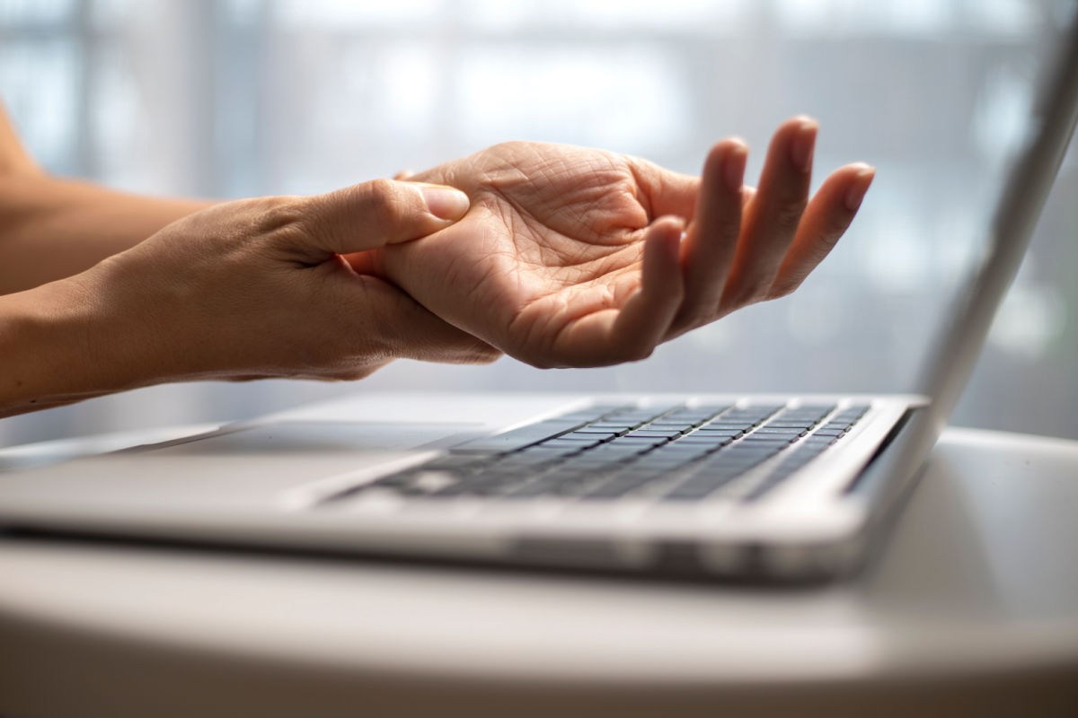 Typing and tapping despite hand pain - Harvard Health